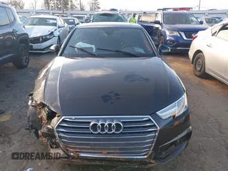 2019 Audi A4 Premium z VIN WAUGMAF41KN004404, wystawiony jako IAAI lot #41649137 z przebiegiem 68 076 mil mil oraz . Historia ofert i sprzedaży dostępna na DreamBid. Obrazek 12.