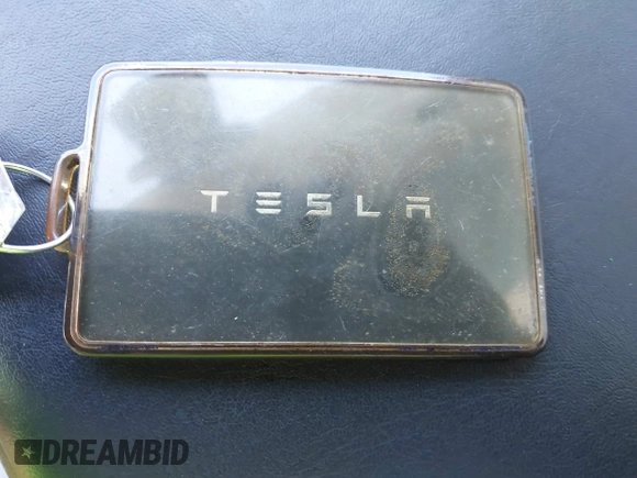 2019 Tesla Model 3 Mid Range with VIN 5YJ3E1EA5KF327181, listed as a IAAI auction lot 41860943 with 157,335 mi miles and . Bid and sale history available at DreamBid. Image 11.