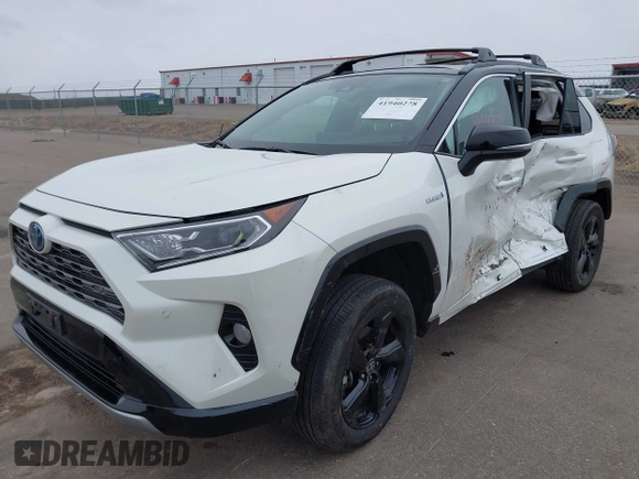 2021 Toyota RAV4 Hybrid XSE with VIN 2T3E6RFV4MW021009, listed as a IAAI auction lot 41940278 with 33,016 mi miles and . Bid and sale history available at DreamBid. Image 17.