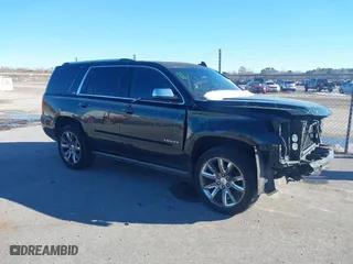 2015 Chevrolet Tahoe LTZ with VIN 1GNSCCKC8FR581994, listed as a IAAI auction lot 41406219 with 187,802 mi miles. Bid and sale history available at carsss.com. Image 13.