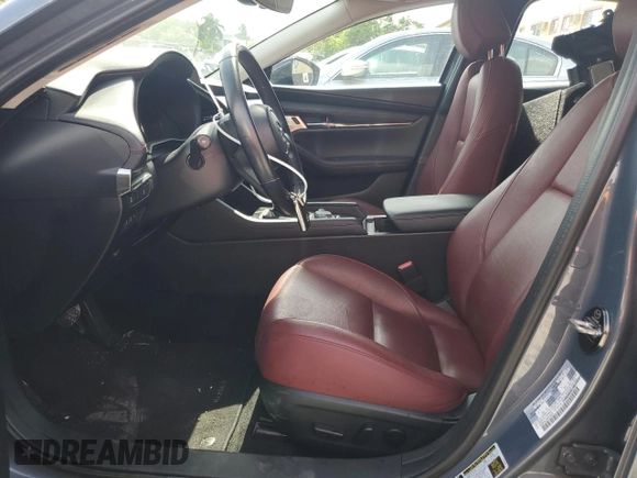 2022 Mazda 3 Carbon Edition с VIN 3MZBPACL3NM318079, выставлен на аукционе Copart как лот 58185015 с пробегом 36 299 миль миль и Списание • Salvage title. История ставок и продаж доступна на DreamBid. Изображение 7.