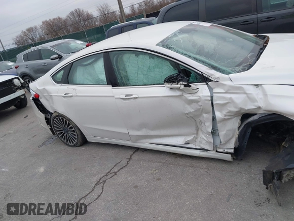 2017 Ford Fusion SE z VIN 3FA6P0HDXHR178108, wystawiony jako IAAI lot #41008773 z przebiegiem 96 598 mil mil oraz . Historia ofert i sprzedaży dostępna na DreamBid. Obrazek 13.