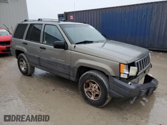1996 Jeep Grand Cherokee Laredo with VIN 1J4GZ58S9TC172760, listed as a Copart auction lot 86086644 with 220,037 mi miles and Clean Title. Bid and sale history available at carsss.com. Image 4.