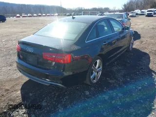 2015 Audi S6 Prestige with VIN WAUF2AFC6FN005448, listed as a IAAI auction lot 41705259 with 34,479 mi miles. Bid and sale history available at carsss.com. Image 4.
