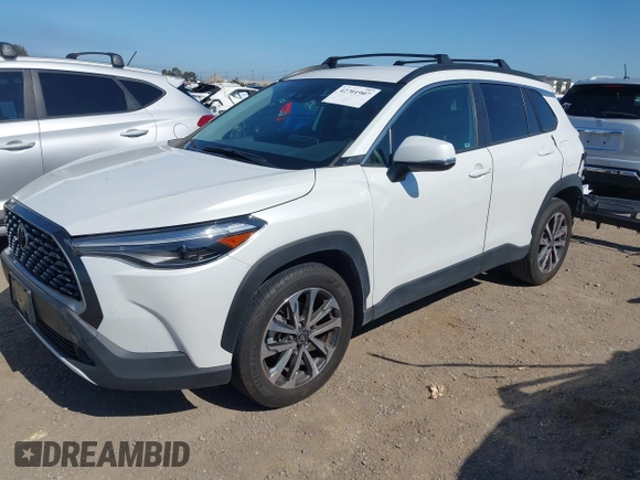 2022 Toyota Corolla Cross XLE with VIN 7MUEAAAG4NV027314, listed as a IAAI auction lot 42701907 with 30,275 mi miles and . Bid and sale history available at DreamBid. Image 2.