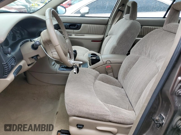 2003 Buick Regal LS z VIN 2G4WB52K731166956, wystawiony jako Copart lot #54233005 z przebiegiem 192 207 mil mil oraz Nie do naprawy • Non repairable. Historia ofert i sprzedaży dostępna na DreamBid. Obrazek 7.