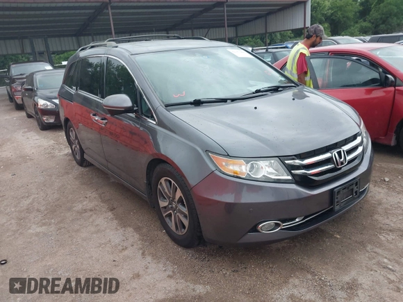 2016 Honda Odyssey Touring Elite with VIN 5FNRL5H96GB063176, listed as a IAAI auction lot 42157604 with 106,177 mi miles. Bid and sale history available at carsss.com. Image 1.
