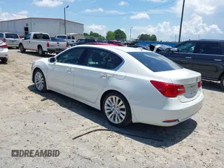 2014 Acura RLX Technology with VIN JH4KC1F55EC000427, listed as a IAAI auction lot 42705778 with 135,057 mi miles and . Bid and sale history available at DreamBid. Image 3.