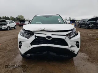 2021 Toyota RAV4 XLE with VIN 2T3P1RFV6MW228427, listed as a Copart auction lot 55323325 with 54,002 mi miles and Salvage title. Bid and sale history available at DreamBid. Image 5.