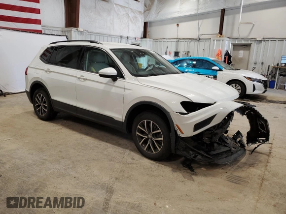 2019 Volkswagen Tiguan SE with VIN 3VV2B7AX0KM157357, listed as a Copart auction lot 55564975 with 57,421 mi miles and Salvage Title. Bid and sale history available at DreamBid. Image 4.