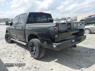 2009 Nissan Titan LE with VIN 1N6BA07D79N317253, listed as a IAAI auction lot 41944642 with 231,896 mi miles. Bid and sale history available at carsss.com. Image 14.