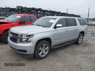 2018 Chevrolet Suburban LT z VIN 1GNSCHKC1JR394991, wystawiony jako IAAI lot #41192222 z przebiegiem 90 313 mil mil oraz . Historia ofert i sprzedaży dostępna na DreamBid. Obrazek 18.
