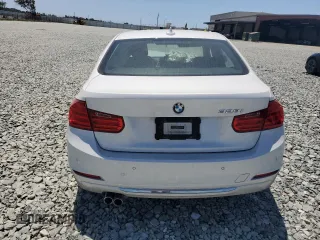 2014 BMW 3 Series 328i with VIN WBA3C1C53EK112799, listed as a Copart auction lot 61493585 with Not provided miles and Salvage title. Bid and sale history available at DreamBid. Image 6.