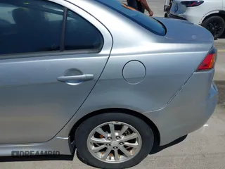 2012 Mitsubishi Lancer SE with VIN JA32V2FW5CU014246, listed as a IAAI auction lot 41981183 with 130,232 mi miles and . Bid and sale history available at DreamBid. Image 6.