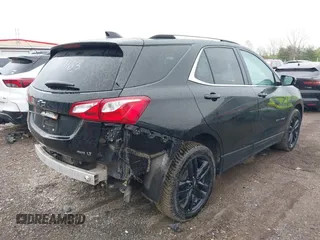 2021 Chevrolet Equinox LT with VIN 2GNAXUEV1M6109163, listed as a IAAI auction lot 42063268 with 119,412 mi miles and . Bid and sale history available at DreamBid. Image 4.