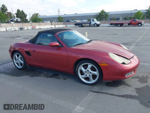 2002 Porsche Boxster z VIN WP0CA29842U621669, wystawiony jako IAAI lot #42218784 z przebiegiem 109 578 mil mil oraz . Historia ofert i sprzedaży dostępna na DreamBid. Obrazek 1.