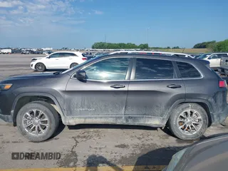 2019 Jeep Cherokee Latitude Plus with VIN 1C4PJMLX8KD418331, listed as a IAAI auction lot 42557107 with 108,096 mi miles and . Bid and sale history available at DreamBid. Image 14.