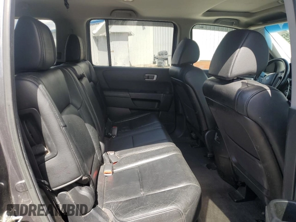 2012 Honda Pilot EX-L z VIN 5FNYF4H5XCB062195, wystawiony jako Copart lot #56716855 z przebiegiem 160 988 mil mil oraz Szkoda całkowita • Salvage title. Historia ofert i sprzedaży dostępna na DreamBid. Obrazek 10.