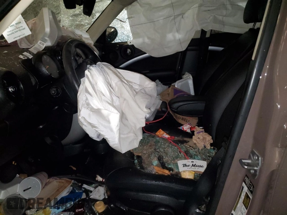 2015 MINI Countryman with VIN WMWZB3C52FWR44105, listed as a Copart auction lot 86780484 with Not Provided miles and Salvage Title. Bid and sale history available at DreamBid. Image 7.