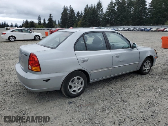 2005 Hyundai Accent GLS z VIN KMHCG45C75U639281, wystawiony jako Copart lot #54887095 z przebiegiem 136 090 mil mil oraz Szkoda całkowita • Salvage title. Historia ofert i sprzedaży dostępna na DreamBid. Obrazek 3.