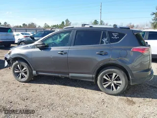 2016 Toyota RAV4 XLE with VIN JTMWFREV4GJ075192, listed as a IAAI auction lot 41395452 with 163,723 mi miles. Bid and sale history available at carsss.com. Image 14.