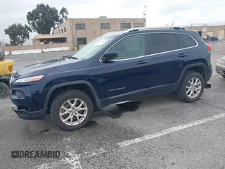 2015 Jeep Cherokee Latitude with VIN 1C4PJMCS2FW538575, listed as a IAAI auction lot 41799474 with 88,197 mi miles and . Bid and sale history available at DreamBid. Image 18.