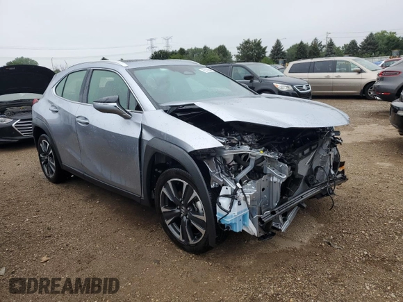 2025 Lexus UX with VIN JTHUCJDH3S2001129, listed as a Copart auction lot 65140554 with 875 mi miles and Salvage Title. Bid and sale history available at carsss.com. Image 4.