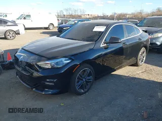 2021 BMW 2 Series 228i xDrive with VIN WBA73AK03M7H66827, listed as a IAAI auction lot 41682959 with 57,875 mi miles and . Bid and sale history available at DreamBid. Image 2.