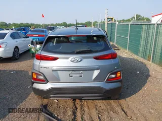2021 Hyundai Kona SE with VIN KM8K12AA4MU614133, listed as a IAAI auction lot 42404789 with 8,956 mi miles and . Bid and sale history available at DreamBid. Image 16.