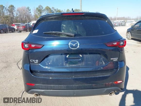 2022 Mazda CX-5 2.5 Turbo with VIN JM3KFBAY4N0534690, listed as a IAAI auction lot 41716988 with 23,910 mi miles and . Bid and sale history available at carsss.com. Image 16.
