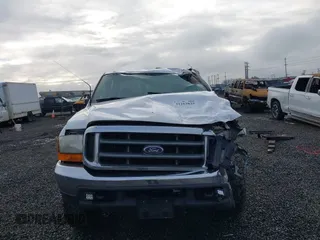 2000 Ford Super Duty F-250 XL with VIN 1FTNW21F8YEA59623, listed as a IAAI auction lot 41263825 with 371,405 mi miles. Bid and sale history available at carsss.com. Image 13.