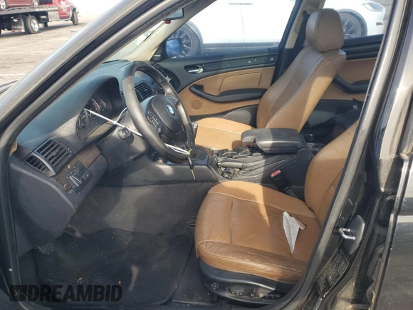 2002 BMW 3 Series 330i with VIN WBAEV53452KM00658, listed as a Copart auction lot 82062874 with 106,031 mi miles and Salvage Title. Bid and sale history available at carsss.com. Image 7.