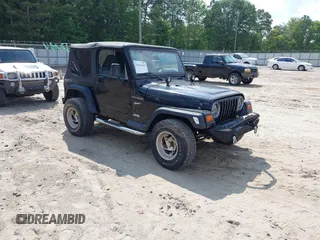 2002 Jeep Wrangler Sport with VIN 1J4FA49S32P700831, listed as a IAAI auction lot 42626269 with 182,870 mi miles and . Bid and sale history available at DreamBid. Image 1.