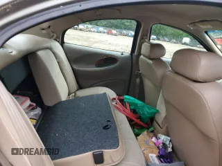 1999 Mercury Sable LS with VIN 1MEFM53U6XG646248, listed as a Copart auction lot 57859405 with 128,286 mi miles and Salvage title. Bid and sale history available at DreamBid. Image 10.