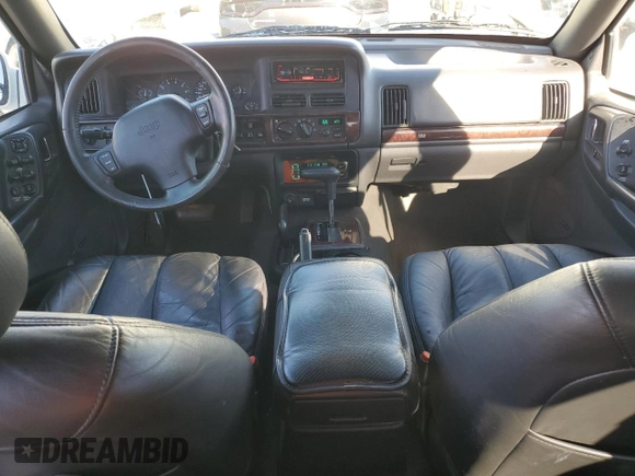 1998 Jeep Grand Cherokee Limited with VIN 1J4GZ88Z9WC180182, listed as a Copart auction lot 88602465 with 266,008 mi miles and Clean Title. Bid and sale history available at carsss.com. Image 8.