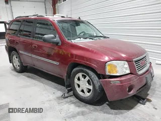 2007 GMC Envoy SLE with VIN 1GKDT13S172139410, listed as a IAAI auction lot 41304010 with 201,099 mi miles. Bid and sale history available at carsss.com. Image 1.