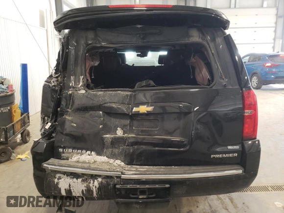 2019 Chevrolet Suburban Premier with VIN 1GNSKJKJ8KR302849, listed as a Copart auction lot 87717275 with 69,498 mi miles and Salvage Title. Bid and sale history available at DreamBid. Image 6.