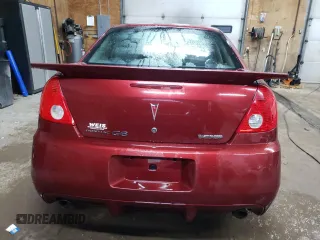 2009 Pontiac G6 GXP 1SA with VIN 1G2ZM577394178197, listed as a Copart auction lot 77670094 with 188,493 mi miles and Clean title. Bid and sale history available at DreamBid. Image 6.