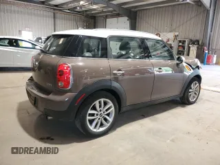 2012 MINI Countryman with VIN WMWZB3C52CWM01672, listed as a Copart auction lot 56064265 with 97,267 mi miles and Salvage Title. Bid and sale history available at DreamBid. Image 3.