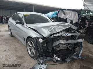 2016 BMW 3 Series Gran Turismo 328i xDrive with VIN WBA8Z5C59GG501996, listed as a IAAI auction lot 41238964 with 71,542 mi miles. Bid and sale history available at carsss.com. Image 1.