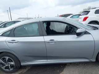 2020 Honda Civic LX with VIN 2HGFC2F65LH544133, listed as a IAAI auction lot 42148441 with 49,063 mi miles and . Bid and sale history available at DreamBid. Image 13.