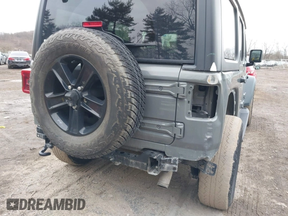 2021 Jeep Wrangler Unlimited Sport Altitude with VIN 1C4HJXDG1MW603784, listed as a IAAI auction lot 41509231 with 102,567 mi miles and . Bid and sale history available at DreamBid. Image 20.