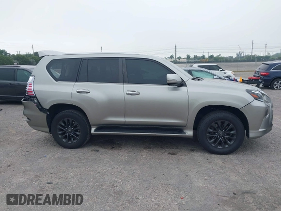2021 Lexus GX 460 Premium z VIN JTJAM7BX2M5298598, wystawiony jako IAAI lot #41875695 z przebiegiem 48 822 mil mil oraz . Historia ofert i sprzedaży dostępna na DreamBid. Obrazek 13.