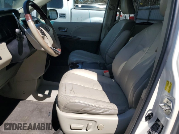 2011 Toyota Sienna XLE AAS with VIN 5TDYK3DC1BS013892, listed as a Copart auction lot 50239495 with 162,184 mi miles and Salvage Title. Bid and sale history available at DreamBid. Image 7.