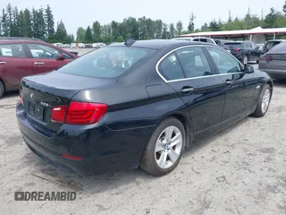 2013 BMW 5 Series 528i xDrive with VIN WBAXH5C59DDW14522, listed as a IAAI auction lot 42580923 with 106,400 mi miles and . Bid and sale history available at DreamBid. Image 4.