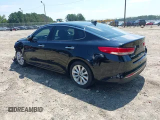 2017 Kia Optima EX with VIN 5XXGU4L36HG123828, listed as a IAAI auction lot 42059856 with 123,305 mi miles and . Bid and sale history available at DreamBid. Image 3.