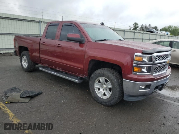 2015 Chevrolet Silverado 1500 LT with VIN 1GCVKREC4FZ301432, listed as a Copart auction lot 57184285 with 186,534 mi miles and Clean Title. Bid and sale history available at DreamBid. Image 4.