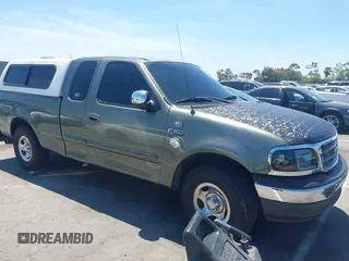 2002 Ford F-150 XL with VIN 1FTRX17272NA07095, listed as a IAAI auction lot 42690735 with Not provided miles and . Bid and sale history available at DreamBid. Image 1.