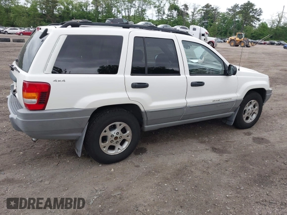 2000 Jeep Grand Cherokee Laredo z VIN 1J4GW48S2YC390226, wystawiony jako IAAI lot #42326715 z przebiegiem 273 806 mil mil oraz . Historia ofert i sprzedaży dostępna na DreamBid. Obrazek 4.
