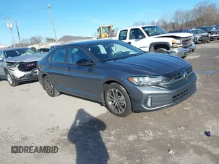 2022 Volkswagen Jetta Sport with VIN 3VWBM7BU1NM023357, listed as a IAAI auction lot 38647076 with 7,596 mi miles and . Bid and sale history available at DreamBid. Image 1.